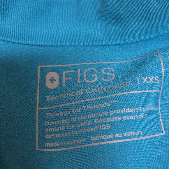 Figs I believe the color is pacific blue scrubs top and bottom are XXS. - Picture 5 of 7